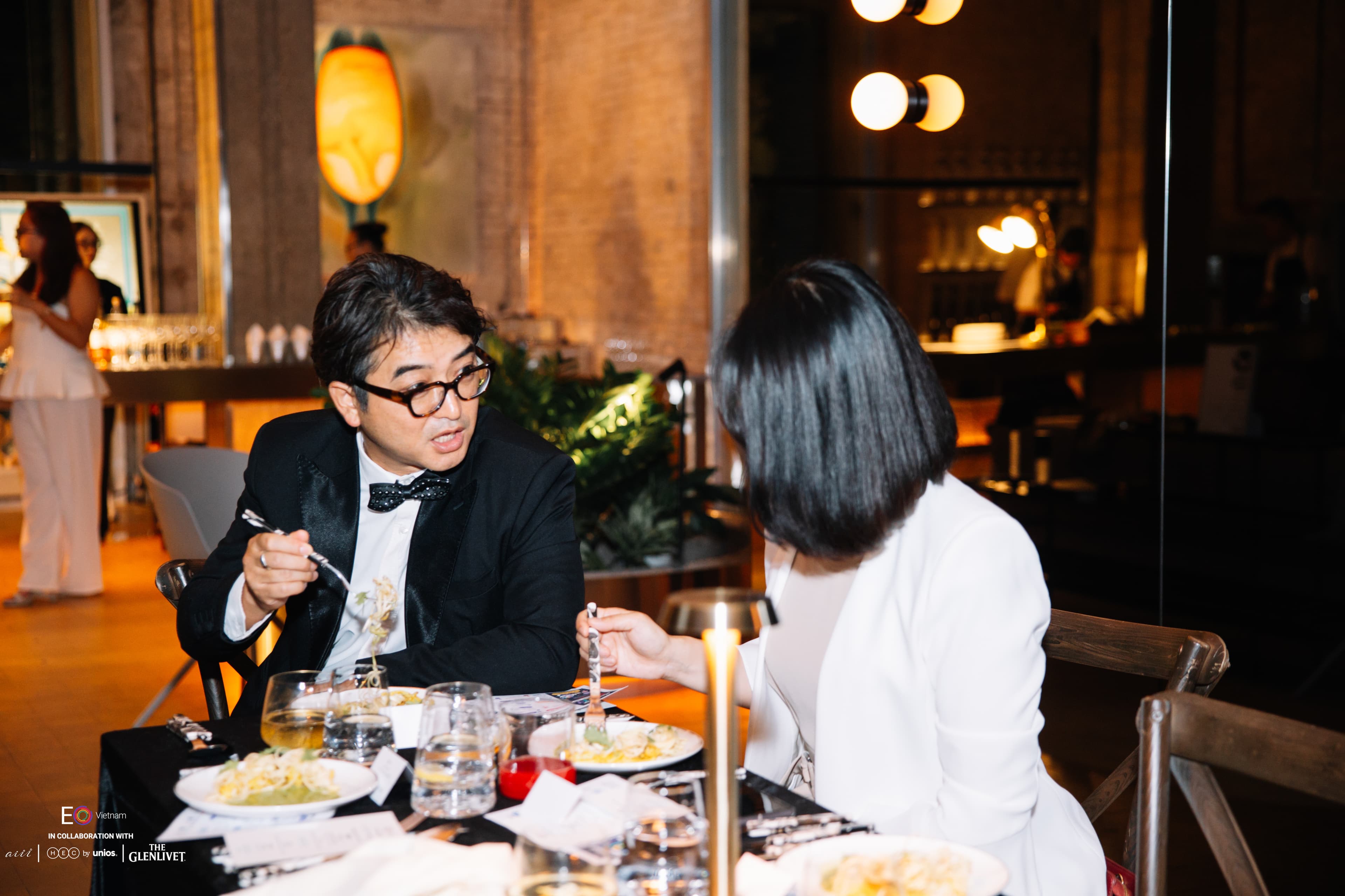 Guests dining on the aiii House Saigon menu at the EO Vietnam Handover