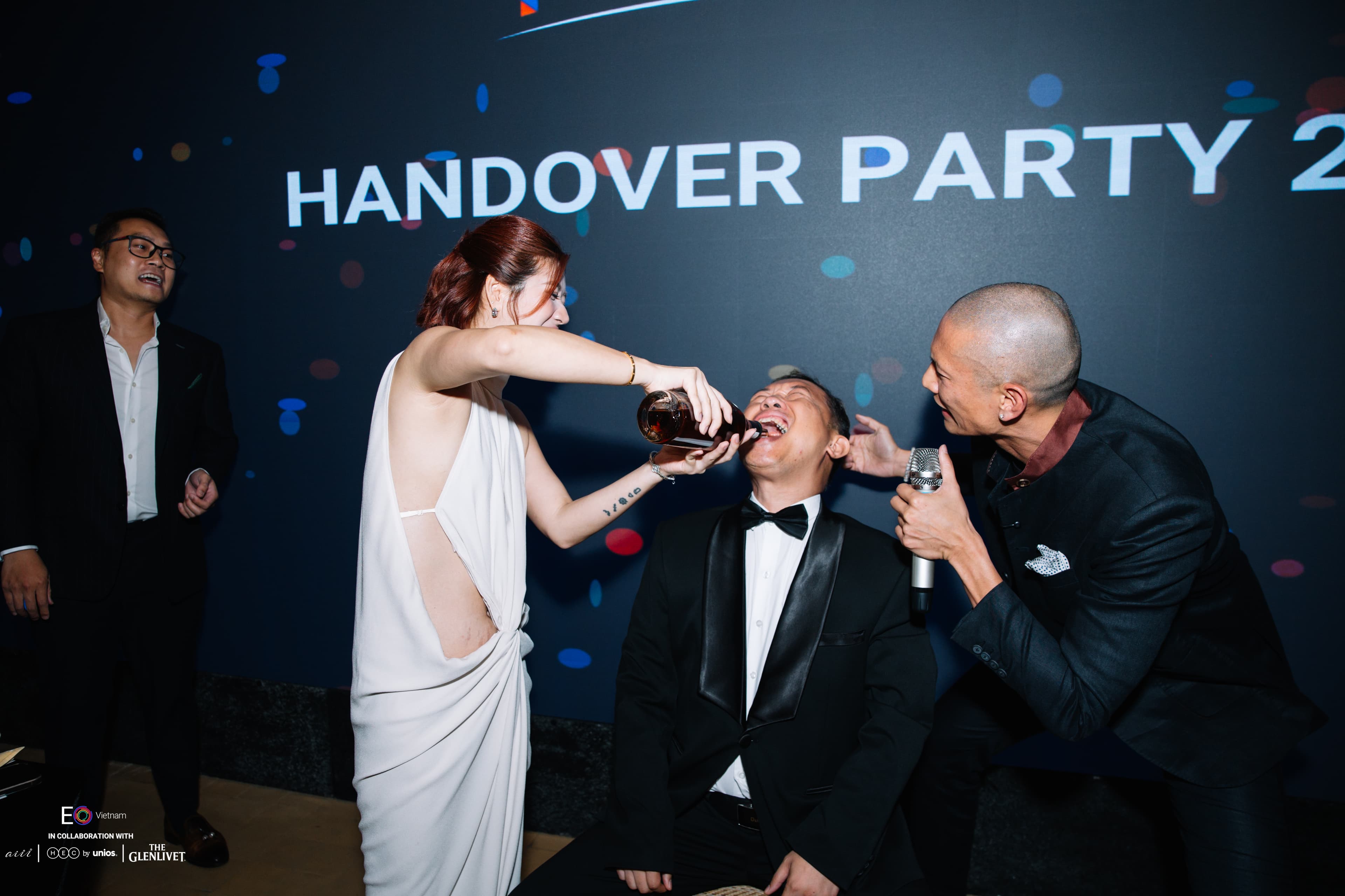 Guests toasting with The Glenlivet at the EO Vietnam FY2026-27 Handover backdrop