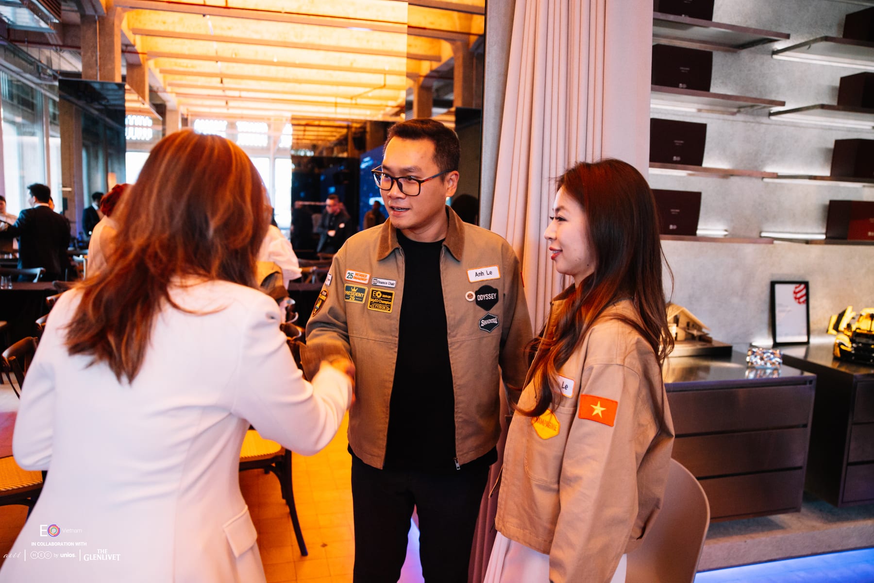 Le Tuan Anh talking with EO Vietnam members at a chapter event